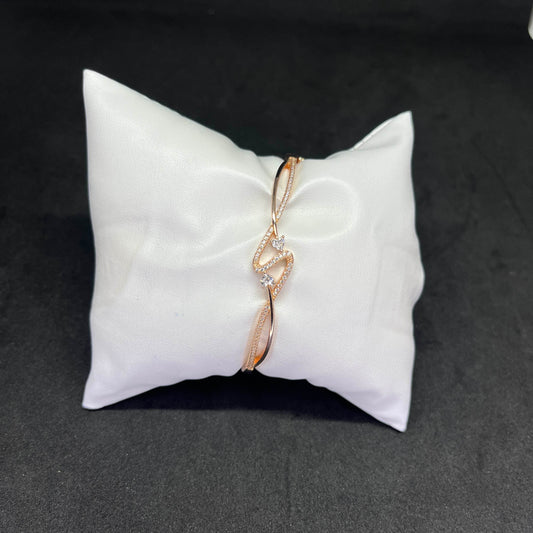 Women’s Twisted Wave Kada in 925 Sterling Silver with Rose Gold Finish & CZ Detailing