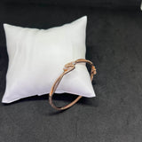 Women’s Twisted Wave Kada in 925 Sterling Silver with Rose Gold Finish & CZ Detailing