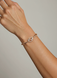 Women’s Twisted Wave Kada in 925 Sterling Silver with Rose Gold Finish & CZ Detailing